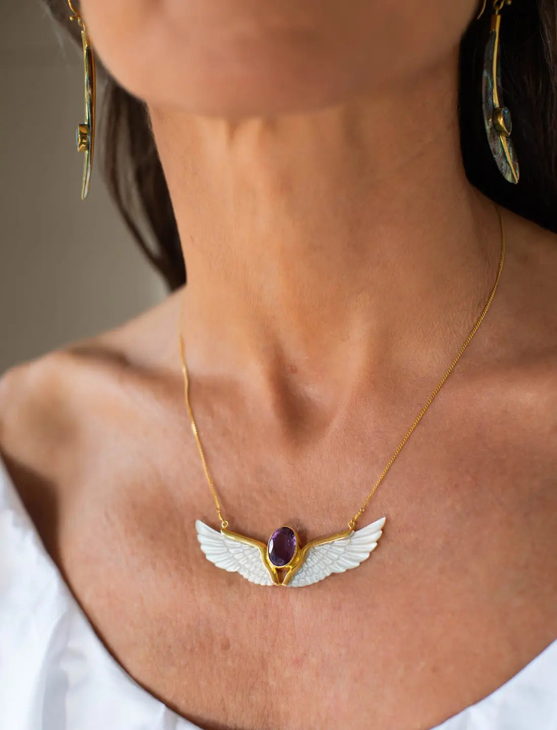 Amethyst Wings Necklace being worn 